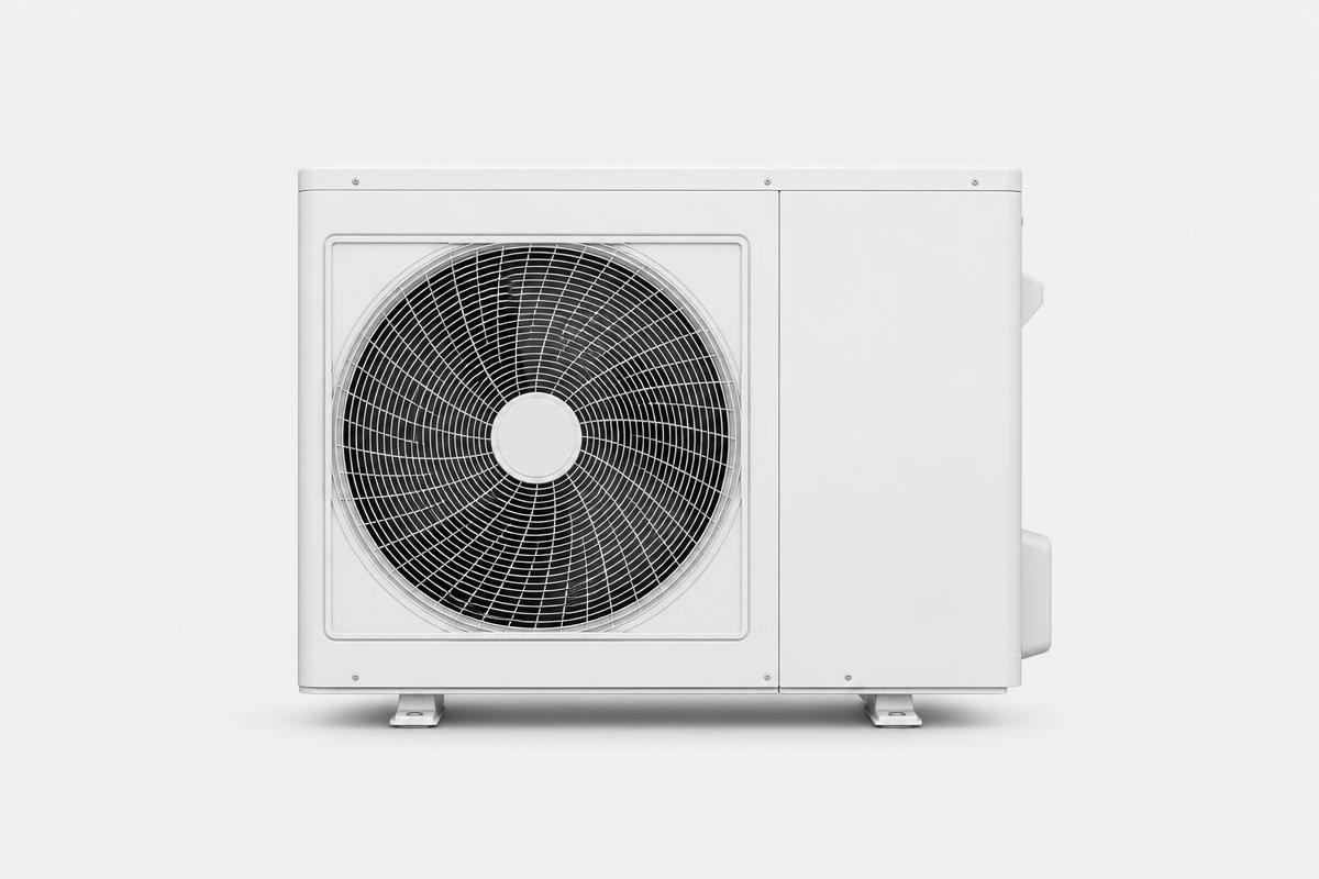 Modern air source heat pump unit on a light grey studio background